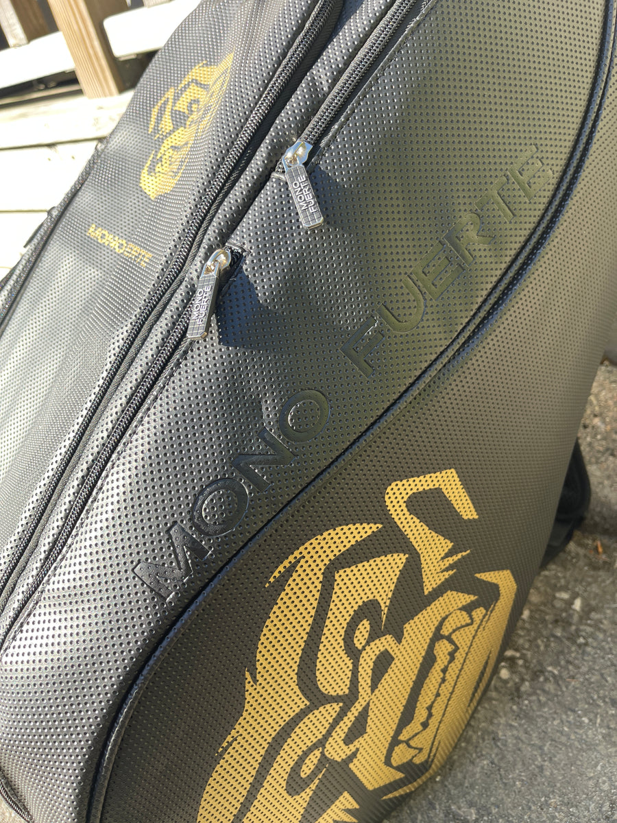 Svart padelbag, mono fuerte padelväska, svart och guld